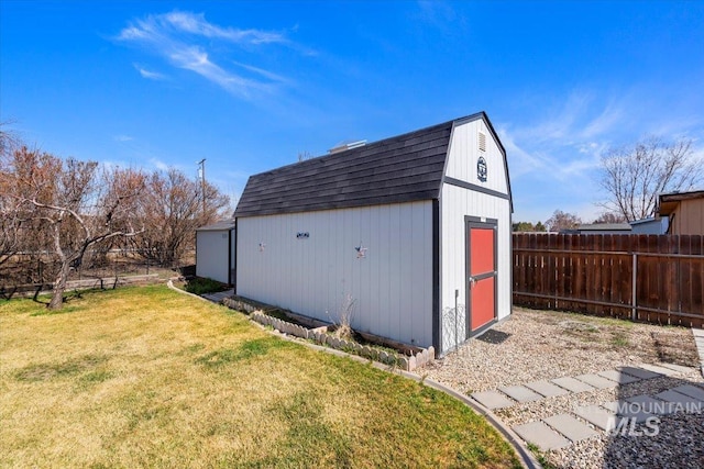 view of shed with fence