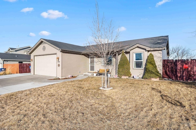 ranch-style house with concrete driveway, a front lawn, an attached garage, and fence