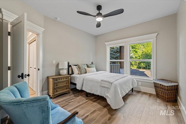 25580 Gooseberry Ln, Caldwell, ID 83607 - bedroom featuring wood finished floors, baseboards, and ceiling fan