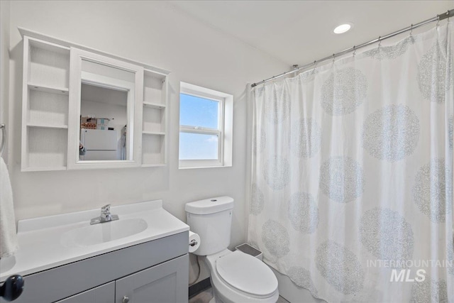 25580 Gooseberry Ln, Caldwell, ID 83607 - full bathroom featuring vanity, toilet, and a shower with shower curtain