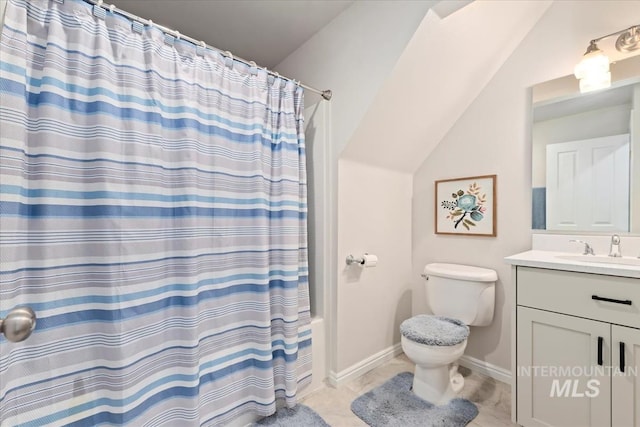 bathroom with tile patterned flooring, shower / bath combo, vaulted ceiling, vanity, and toilet