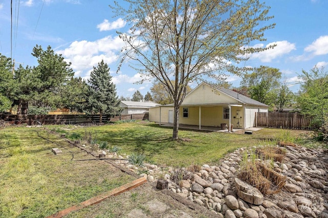 view of yard featuring a fenced backyard and a patio