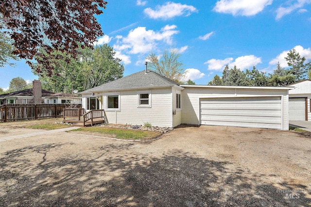 exterior space with fence and a wooden deck