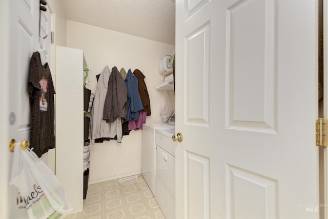 interior space featuring light floors and separate washer and dryer