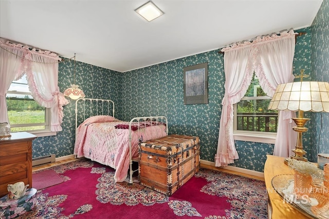 bedroom featuring a baseboard radiator