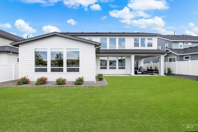 7469 W Diamond Lake Dr, Boise, ID 83714 - rear view of house featuring a patio area and an outdoor living space