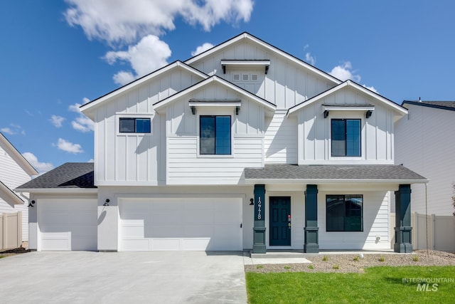 206 Marble Ave, Caldwell, ID 83605 - modern inspired farmhouse with board and batten siding, a shingled roof, an attached garage, and driveway