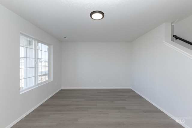 206 Marble Ave, Caldwell, ID 83605 - spare room featuring wood finished floors and baseboards