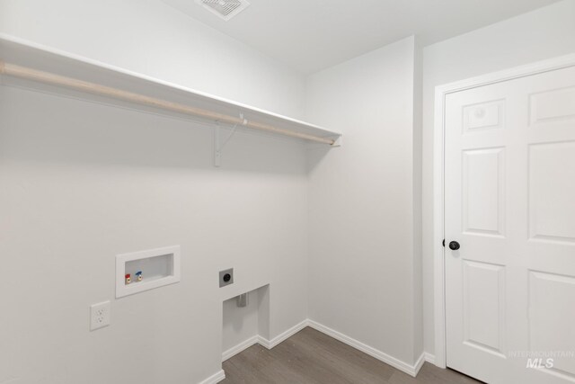 206 Marble Ave, Caldwell, ID 83605 - washroom with washer hookup, hookup for an electric dryer, wood finished floors, and baseboards