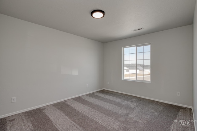 206 Marble Ave, Caldwell, ID 83605 - carpeted empty room featuring baseboards