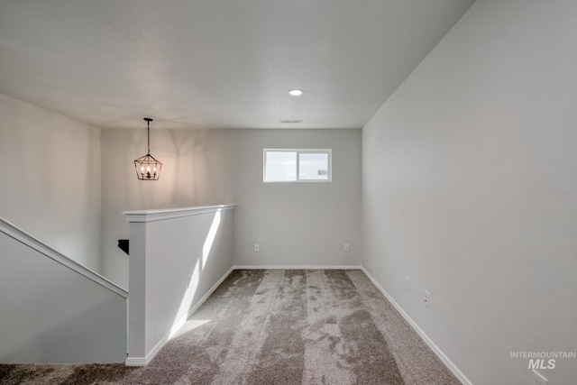 206 Marble Ave, Caldwell, ID 83605 - empty room with carpet floors, baseboards, recessed lighting, and a chandelier
