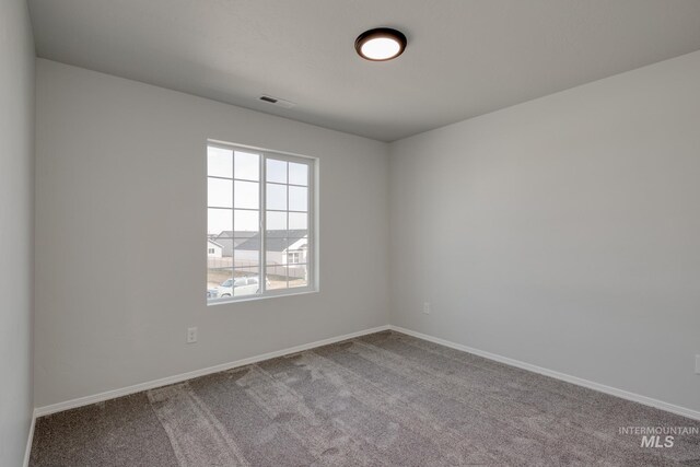 206 Marble Ave, Caldwell, ID 83605 - unfurnished room with carpet floors and baseboards