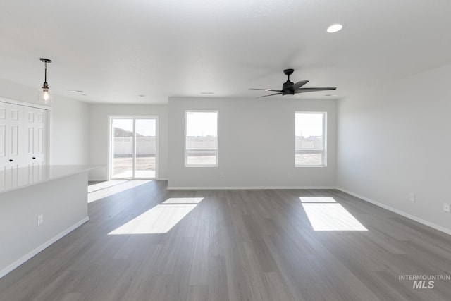 206 Marble Ave, Caldwell, ID 83605 - spare room featuring baseboards, a ceiling fan, dark wood-style floors, and recessed lighting