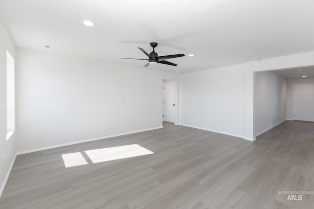 206 Marble Ave, Caldwell, ID 83605 - unfurnished room featuring light wood-style floors, baseboards, recessed lighting, and ceiling fan