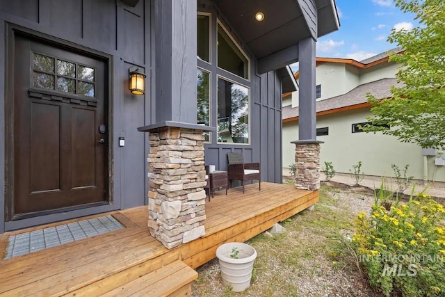 doorway to property featuring covered porch