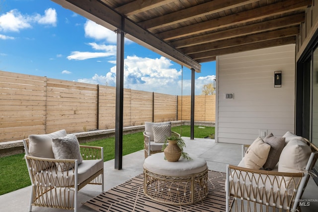 view of patio / terrace with outdoor lounge area and a fenced backyard