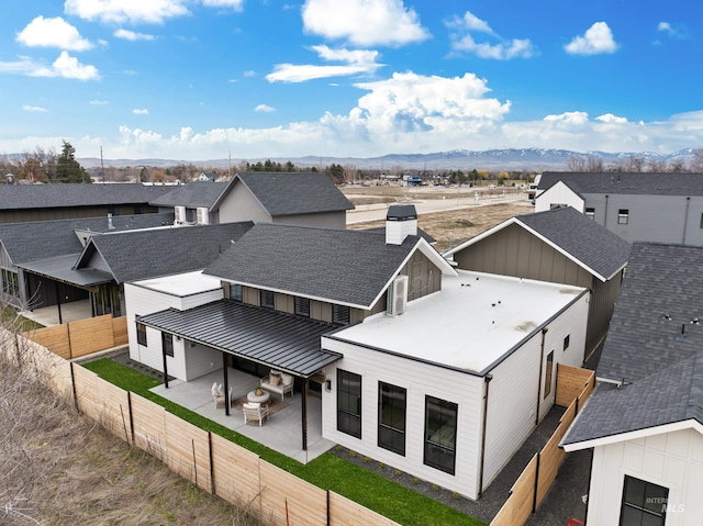 bird's eye view featuring a residential view and a mountain view