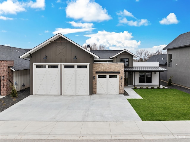 view of front of property featuring a front lawn, a standing seam roof, board and batten siding, concrete driveway, and an attached garage