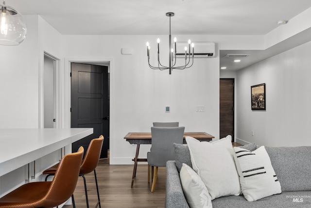 1620 W Bannock St # 303, Boise, ID 83702 - dining space with an AC wall unit, a chandelier, dark wood-type flooring, baseboards, and recessed lighting