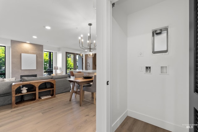 1620 W Bannock St # 303, Boise, ID 83702 - dining area featuring plenty of natural light, light wood-style floors, a chandelier, baseboards, and recessed lighting