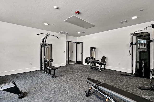 1620 W Bannock St # 303, Boise, ID 83702 - exercise room with attic access, baseboards, and recessed lighting