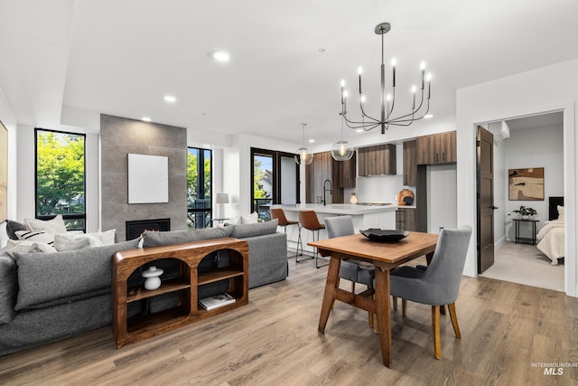 1620 W Bannock St # 303, Boise, ID 83702 - dining room with plenty of natural light, light wood finished floors, a chandelier, and recessed lighting