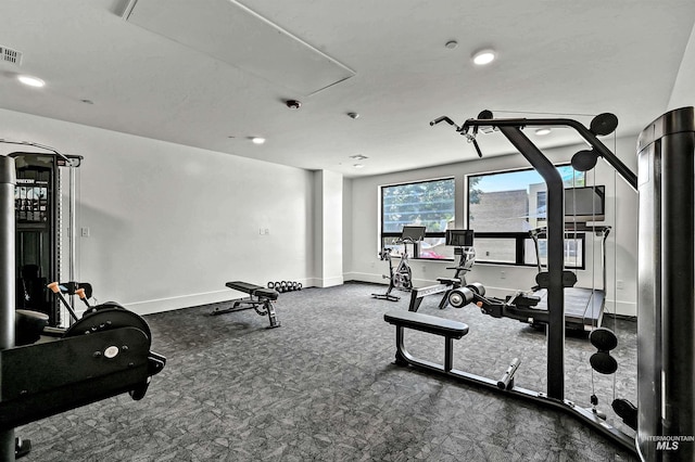 1620 W Bannock St # 303, Boise, ID 83702 - exercise room featuring attic access, baseboards, dark colored carpet, and recessed lighting