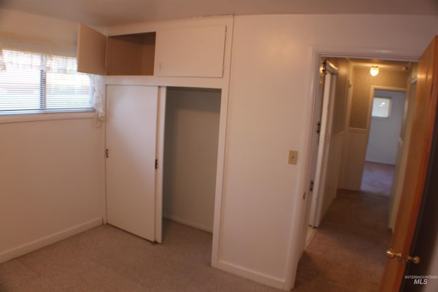 unfurnished bedroom with a closet