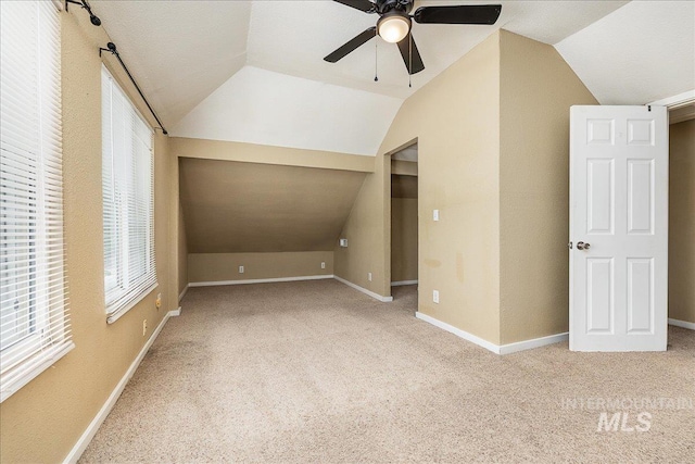 723 4th Ave N, Nampa, ID 83687 - additional living space with lofted ceiling, a ceiling fan, and carpet