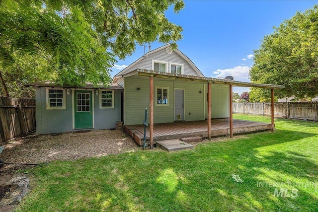 723 4th Ave N, Nampa, ID 83687 - rear view of property with a deck and a fenced backyard