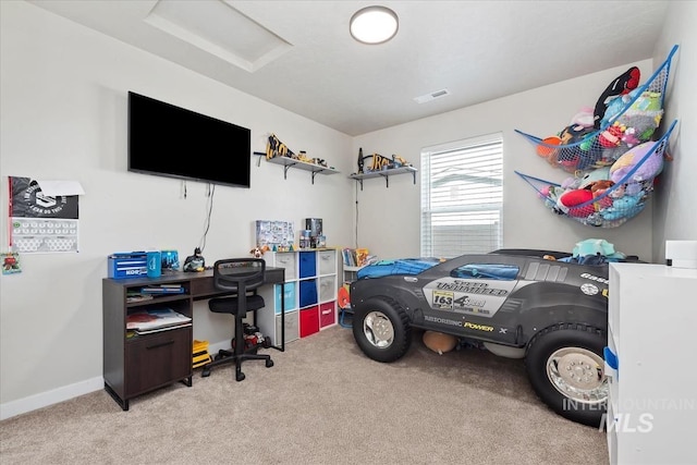 bedroom featuring light carpet