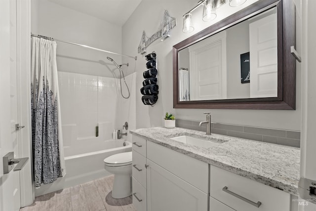 540 E Andes Dr, Kuna, ID 83634 - full bathroom with vanity, shower / bath combo with shower curtain, and wood finished floors