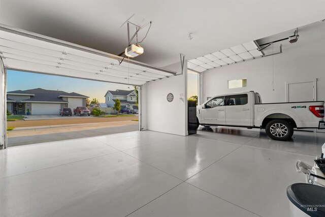 540 E Andes Dr, Kuna, ID 83634 - garage featuring a garage door opener