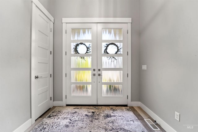540 E Andes Dr, Kuna, ID 83634 - foyer entrance featuring french doors and wood finished floors