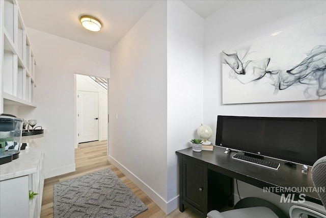 office space featuring light wood-type flooring