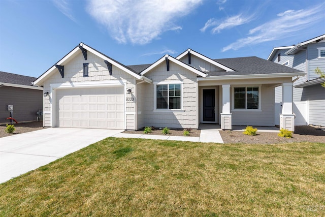 8333 S Updale Ave, Meridian, ID 83642 - view of front facade featuring a garage, roof with shingles, a front lawn, and concrete driveway