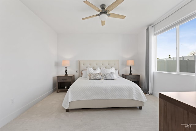 8333 S Updale Ave, Meridian, ID 83642 - bedroom with baseboards, light colored carpet, and ceiling fan