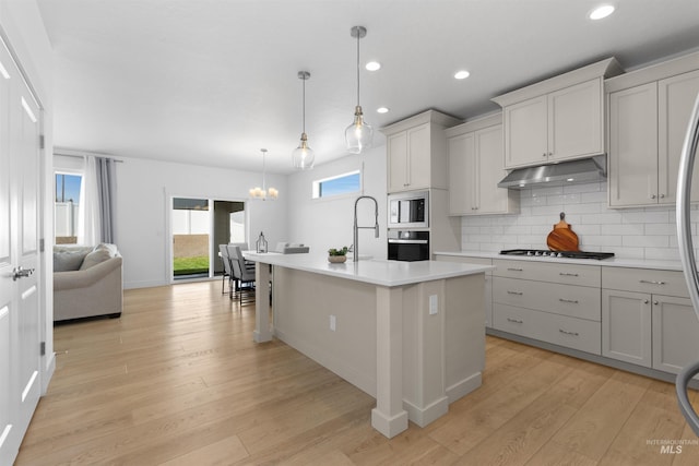 8333 S Updale Ave, Meridian, ID 83642 - kitchen with built in microwave, oven, gas stovetop, and light countertops