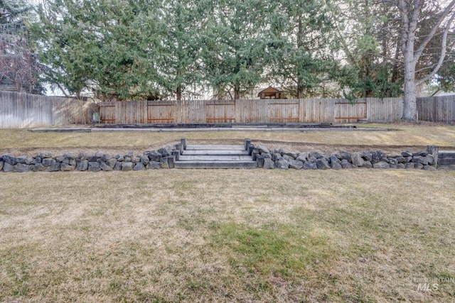 view of yard featuring a fenced backyard