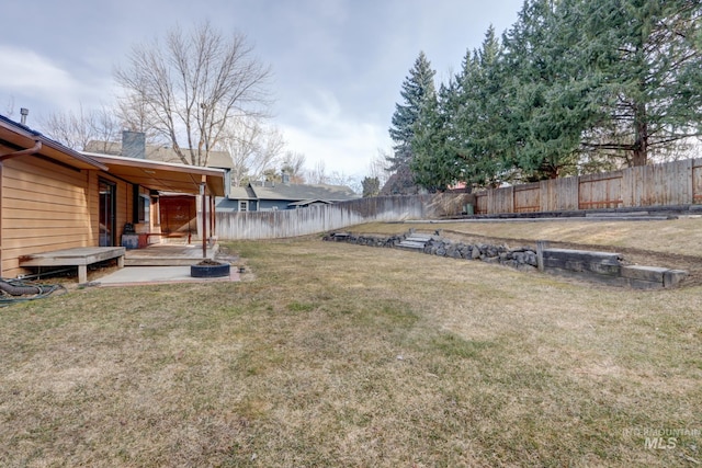 view of yard featuring a fenced backyard