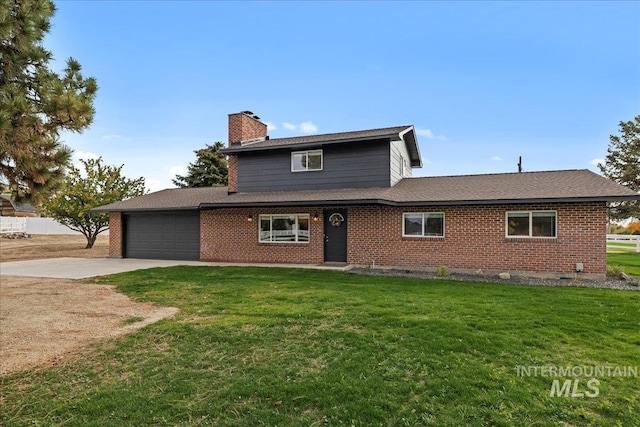 front facade featuring a garage and a front yard