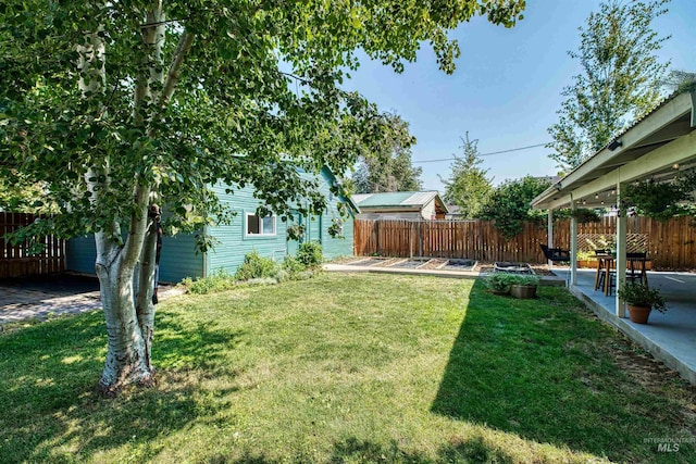 view of yard with a patio area and fence