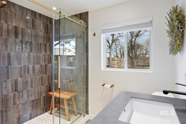 2672 E 4000 N, Twin Falls, ID 83301 - bathroom featuring tiled shower and vanity