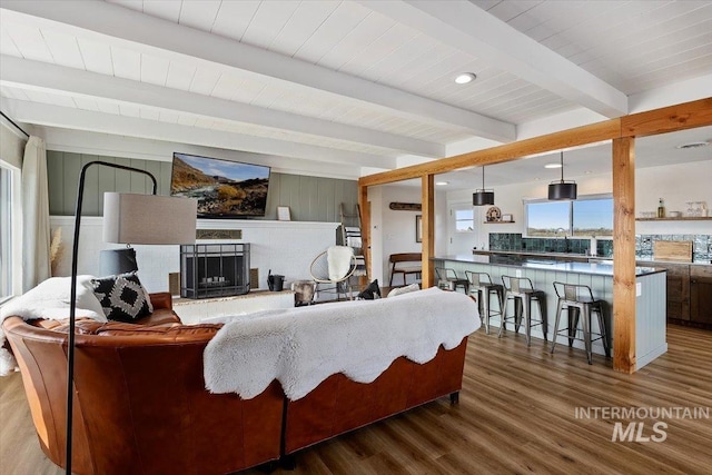 2672 E 4000 N, Twin Falls, ID 83301 - living room with wood finished floors, beamed ceiling, and a fireplace