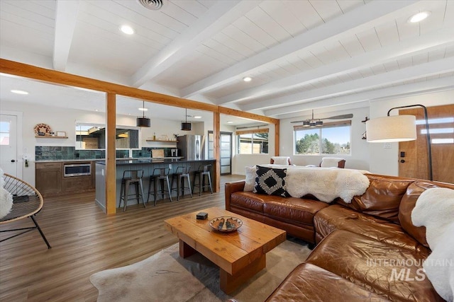 2672 E 4000 N, Twin Falls, ID 83301 - living area with wood finished floors, recessed lighting, and beam ceiling