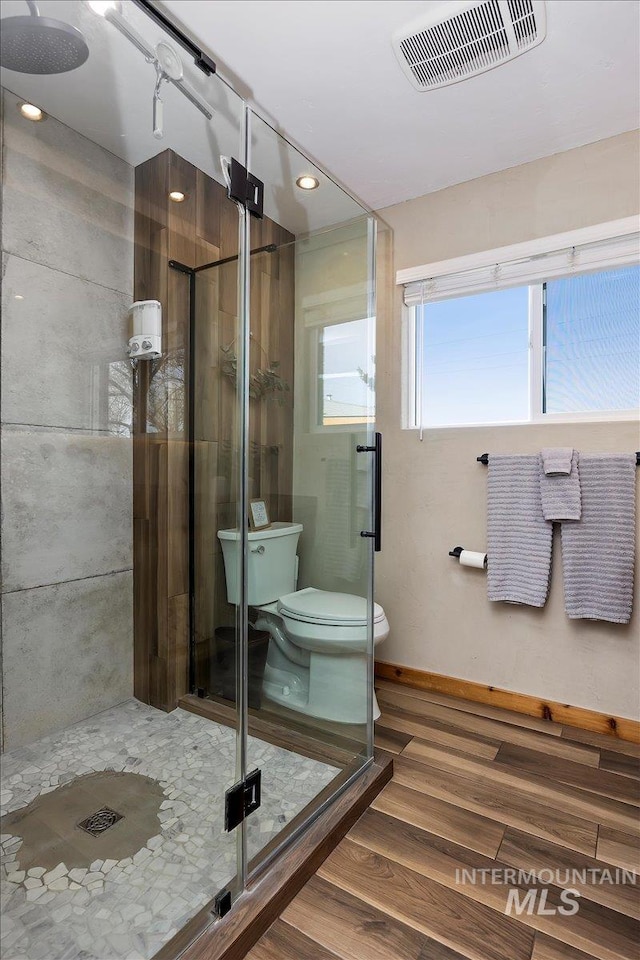2672 E 4000 N, Twin Falls, ID 83301 - full bathroom with toilet, a stall shower, wood finished floors, and baseboards