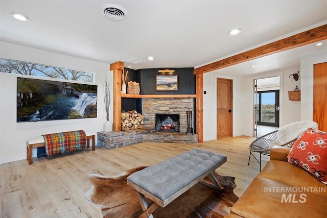 2672 E 4000 N, Twin Falls, ID 83301 - living room featuring wood finished floors, recessed lighting, a fireplace, baseboards, and beam ceiling