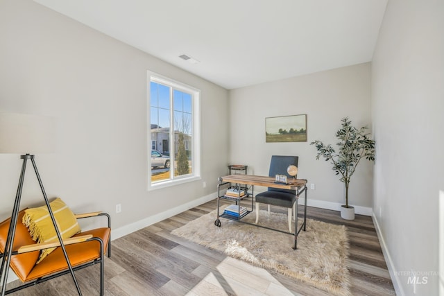 office area with light wood-type flooring