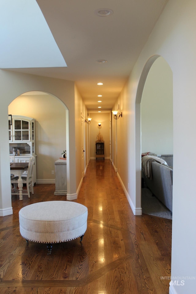 hallway featuring dark hardwood / wood-style floors