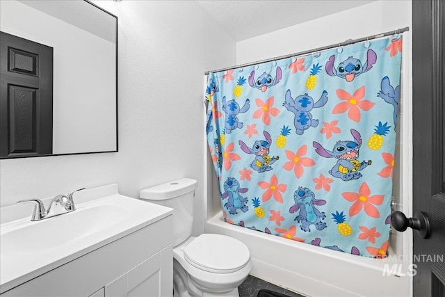 full bath with vanity, shower / bathtub combination with curtain, and toilet